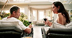 Discussion, wine and couple in luxury spa for weekend, holiday or bonding by swimming pool. Man, woman or talking with alcohol, drink or glass for honeymoon vacation together in resort or retreat