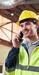 Smile, man and engineer at site with phone call, planning and contact supervisor for construction. Happy, male person or talking at workshop with mobile, inspection approval and architecture progress
