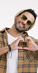 Face, studio and man with hands in heart for kindness, compassion and love gesture for care. Portrait, sunglasses and happy person with emoji for support, positivity and gratitude on white background