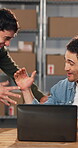 Team, excited and handshake at laptop for logistics, commission target and small business success. Entrepreneur, people and shaking hands in tech for distribution goal, good review and partnership