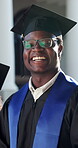 Happy, face and black man at graduation ceremony for college degree, education milestone or laugh. Male person, university graduate and success or achievement of goals, future and academic excellence