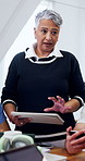 College, lecturer and woman with tablet, lesson and planning for assignment with research in class. Education, online and people with tech, discussion and  mature professor with advice in university