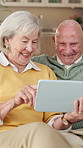 Senior, couple and laugh in home with tablet, watch comedy movie and bonding together for retirement. Happy, married elderly people and talk in house with tech, funny online show and entertainment.
