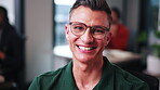 Professional, glasses and face of business man in office for about us, advertising strategist and pride. Smile, growth marketing manager and opportunity with employee in coworking agency for startup
