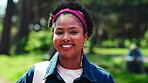 Face, woman and happy on campus for education, future and academic development with student outdoor. Smile, portrait and person with backpack in park, educational opportunity and college for growth