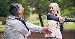 Senior, couple and stretching with high five outdoor, exercise and wellness with cardio support. Arm warm up, fitness and happy woman with partner for motivation, healthy lifestyle and retirement