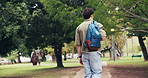 Back, man and student at park for education, new semester and scholarship for studying abroad. Male person, walk or admission in nature for exchange program, academic bursary and learning opportunity
