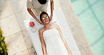 Woman, massage and skincare at resort with cucumber, reduce puffiness and treatment of deep tissue. Above, masseuse and mature person at retreat with vegetable, facial shine and therapeutic wellness