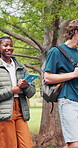 Group, students and happy with walk on campus, learning and higher education opportunity with friends. Conversation, smile and people outdoor for growth, back to school and university together