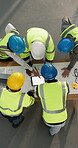 Builder, team and research with tablet screen in building, above and plan for property development. Construction, collaboration and people with blueprint, mockup space and discussion with electrician