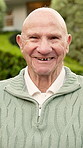 Happy, face and old man outdoor by home with retirement wellness, positive attitude and stress free. Elderly person, smile or good mood in neighborhood with house, fresh air or relax with contentment