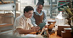 Office, team and people with tech for shipping, logistics and planning for delivery schedule. Meeting, tablet and man with woman on laptop with help for distribution, supply chain or inventory system