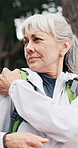 Woman, shoulder and pain in woods for hiking, discomfort and sprain accident on retirement getaway. Worry, senior person and massage in nature with muscle fatigue, inflammation and trekking burnout