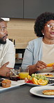 Family, grandmother and talk at house for breakfast, fresh fruit and diet for healthy lifestyle. African people, eating and child in home with beverage, organic snack and homemade pancakes for brunch
