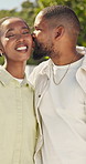Love, smile and couple with cheek kiss, happy partner and outdoor bonding in healthy relationship. Tender, bokeh and black people with forehead touch, connection and romantic moment in backyard.