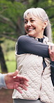 Senior, stretching or happy couple with high five in nature for outdoor workout preparation together. Active, elderly man and woman getting ready with smile or warm up for fitness, health or wellness
