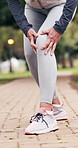 Elderly, person and hands with knee pain for accident, outdoor workout mistake or muscle tension. Active, senior or sore leg with discomfort or massage for strain, pressure or joint inflammation