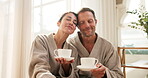 Couple, mature and peace with tea at spa, trust and commitment with anniversary getaway. Calm, relax and embrace with herbal drink, people and together on relationship milestone trip at resort