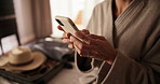 Phone, hands and woman in bedroom at hotel for guest review, digital check in and social media. Typing, travel and person with cellphone for accommodation, hospitality and website for room service