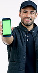 Logistics, phone and happy man with green screen, mockup and delivery monitoring in ux design. Distribution, face and courier with chroma key, order track and shipment progress on studio background.