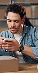 Ecommerce, man and package with phone for picture, scan customer info and upload to app for courier. Person, tech and photograph in warehouse with box for delivery, online scanner or shipping website