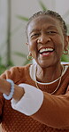 Wellness, face and senior woman in home with laugh, positive attitude and unwind on weekend break. Wellbeing, happy and black person with confidence, good mood and satisfaction in retirement. 