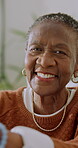 Wellness, face and elderly woman in home with smile, positive attitude and unwind on weekend break. Wellbeing, happy and black person with confidence, good mood and satisfaction in retirement. 