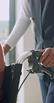Caregiver, hands and help patient with wheelchair, medical rehabilitation or assisted living in home. House, nurse and person with disability, stroke recovery and healthcare for healing from injury.