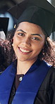 Happy, face and woman at graduation ceremony for college degree, education milestone and pride. Female person, university graduate and success or achievement of goals, future and academic excellence