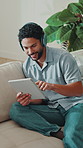 Headphones, happy and woman with tablet on sofa for streaming song, audio and listen to podcast. House, relax and person on digital tech for radio, track and scroll with music subscription on weekend