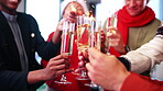Hands, champagne and sparklers in business for Christmas, festive celebration and last day of work. People, team function and happy at office party for xmas event, fireworks and cheers with drink