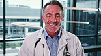 Face, man and happy doctor in hospital for healthcare, wellness service and laugh with career pride. Portrait, physician and mature person with smile, trustworthy or work ethic of medical employee