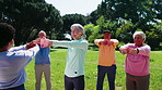 Fitness, trainer or elderly people in park with stretch, active or workout group in wellness hobby. Happy, instructor or senior team with mobility, training together or keeping fit in retirement.