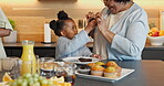 Muffin, breakfast and grandmother with black child in home for health, connection and support. Brunch, wellness and nutrition with family eating in dining room of house for food, bonding and meal