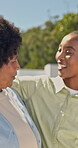 Love, old mother and woman outdoor with chat, happy moment and bonding in healthy relationship. Smile, adult daughter and black family with conversation, security or parent connection in quality time