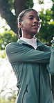 Fitness, nature and black woman with stretching for outdoor workout preparation or training. Active, female person or getting ready with breathing or arm warm up for exercise, health or wellness