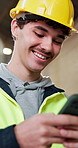 Construction, laugh and man on site with phone, online chat and meme reaction on social media. Humor, texting and happy person with tech, funny communication and message notification on virtual app.
