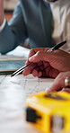 Hands, blueprint and planning with architect team for design review, construction or evaluation. Collaboration, document or people with building layout, engineering schematic or brainstorming at site