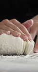 Cooking, knead and hands of chef with dough in kitchen at restaurant for pizza, bread or pastry recipe. Baking, ingredients and culinary worker press batter for preparing food, meal or snack in diner