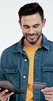 Credit card, tablet and happy man in studio for online shopping, digital payment and purchase. Smile, white background and person with tech, bank app and debit info for ecommerce, discount or sale