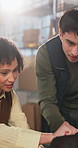 People, laptop and talking in small business for logistics, supplier info and review stock on web. Entrepreneur, tech or employee in warehouse for explain schedule, update inventory and distribution
