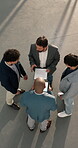 Manager, checklist or tech in office for team meeting, agent coordination or buyer matching. Tablet screen, men or lead realtor with clipboard, market update or graphs for property trends from above