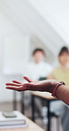 Professor, hand and teaching in university with class, higher education and discussion for knowledge. Lecturer, woman and lesson in college with presentation, academic course and explain to students.
