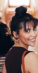 Student, face and woman with books in college, walk and confident for academic growth and learning. University, education and happy person with study opportunity, portrait and skill development