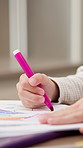 Hands, child and pencil at house with drawing, coloring stationery and art activity for education. Kid, writing and learning in lounge with sketch, academic talent and creative artwork for homework