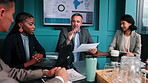 Manager, team and talk in office with document, sales stats or customer database for lead generation. Boss, people and conversation in business with paperwork, revenue analysis and conversion rate.