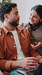 Love, couple or talk in home with laptop, explain startup proposal or venture progress with support. Entrepreneur, happy people or hug with tech on sofa for small business plan, pitch update or trust