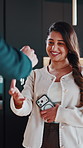 Realtor, woman and happy with keys for new home handover, property closing or mortgage success. Agent, homeowner and keychain in house for real estate purchase, moving day and transfer of possession