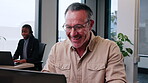 Man, realtor and happy in office with laptop, viewing booking and update property listing on website. Mature agent, tech and coworking in firm with reading or auction opportunity for extra commission