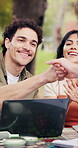 Laptop, students and smile on campus with fist bump, exam results or academic goals in study group. Support, tech and happy people at college with celebration, test pass or clap for collective effort